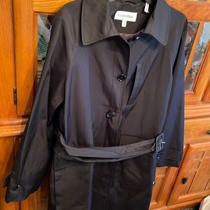 Calvin Klein ladies coat, size large, 3 pockets knee length new without tags